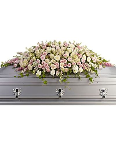 <div id="mark-1" class="m-pdp-tabs-marketing-description">A graceful and magnificent cascade of delicate pale pink, white, and crème flowers conveys everlasting affection for the radiant spirit being honored, and gently eases sorrow for those paying respect.</div>
<div id="desc-1">
<ul>
 	<li>Soft and feminine, this casket top display is composed of flowers such as pink hydrangea, roses and larkspur, along with white roses, stock and waxflower, accented by ivy, parvifolia eucalyptus and leatherleaf fern.</li>
</ul>
</div>