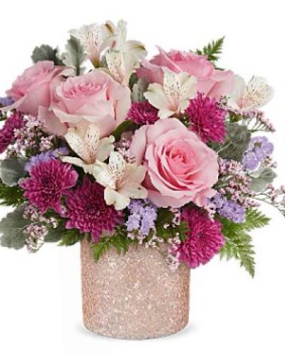 <div id="mark-3" class="m-pdp-tabs-marketing-description">Add a touch of sparkle to Mom's day with Teleflora's Blooming Brilliant cylinder, boasting a crushed glass texture and a soft ballerina pink hue, perfect for showcasing a dreamy Mother's Day bouquet.</div>
&nbsp;
<div id="desc-3">Elevate mom's day with Teleflora's Blooming Brilliant cylinder, boasting a crushed glass texture in ballet pink, perfectly complementing a bouquet of pink roses, ivory alstroemeria, purple cushion spray chrysanthemums, lavender sinuata statice, pink limonium, dusty miller, and leatherleaf fern, a dazzling Mother's Day surprise.</div>