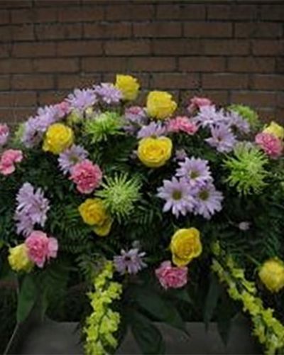 A graceful and magnificent cascade of delicate pale pink, purple, yellow and green flowers conveys everlasting affection for the radiant spirit being honored, and gently eases sorrow for those paying respect.
<ul id="prodDetailDelivery">
 	<li><span style="color: red"><b>Local Delivery Only</b></span></li>
</ul>