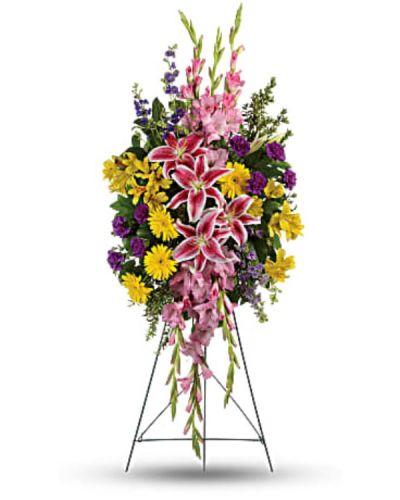 <div id="mark-1" class="m-pdp-tabs-marketing-description">Your sincere wishes for peace and harmony resonate beautifully in this perfectly balanced arrangement of pink lilies, yellow gerberas and purple larkspur.</div>
<div id="desc-1">
<ul>
 	<li>This inspiring spray includes pink stargazer lilies, yellow gerberas, yellow alstroemeria, pink gladioli, purple carnations and purple larkspur accented with oregonia and lemon leaf.</li>
</ul>
</div>