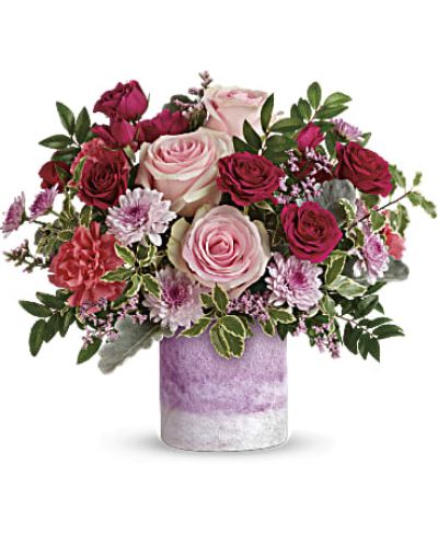 <div id="mark-3" class="m-pdp-tabs-marketing-description">Pretty as can be! Honor their latest accomplishment or celebrate a special day with this fabulous bouquet of pink roses and lavender blooms, hand-arranged in a frosted art glass vase finished in the perfect shade of pink.</div>
&nbsp;
<div id="desc-3">
<ul>
 	<li>Pink roses, dark pink spray roses, pink carnations, lavender cushion spray chrysanthemums and lavender limonium are arranged with dusty miller, huckleberry and pitta negra.</li>
</ul>
</div>