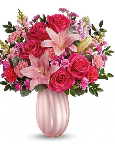 <div id="mark-3" class="m-pdp-tabs-marketing-description">Capture Mom's heart with our pearlescent Teleflora's Rosy Swirls vase, radiating elegance and charm, paired with a bouquet of pink roses and lavender blooms, a delightful Mother's Day surprise she'll cherish.</div>
&nbsp;
<div id="desc-3">Create magic for Mom with Teleflora's Rosy Swirls vase, complemented by a bouquet of hot pink roses, pink asiatic lilies, light pink and hot pink carnations, miniature carnations, pink snapdragons, light pink stock, raspberry sinuata statice, huckleberry, and dusty miller, a radiant Mother's Day surprise she'll cherish.</div>